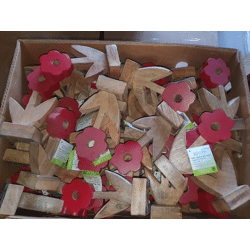 Decorative red wooden flower on a base 