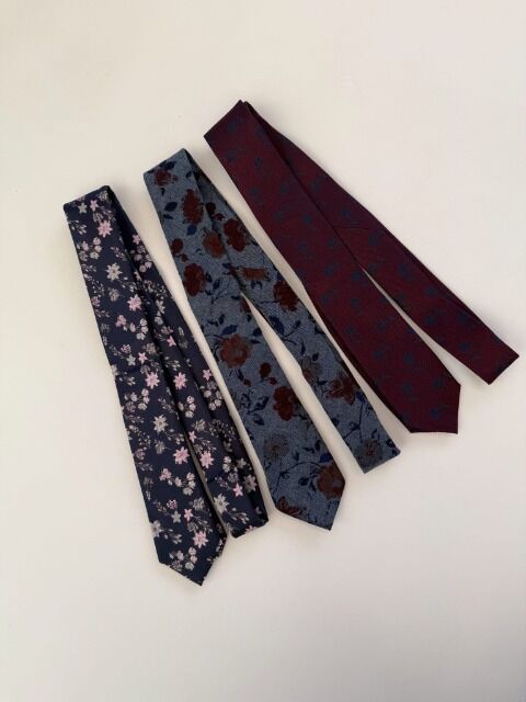 Mix aus Krawatten und Fliegen