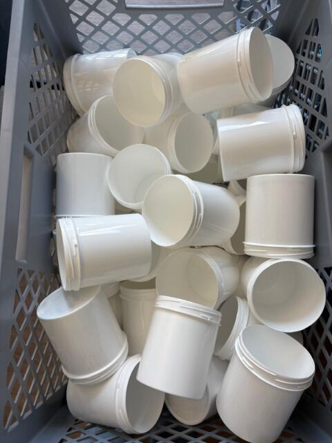 Empty cans with matching lids