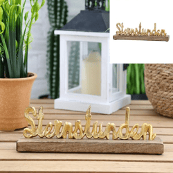 Lettering Sternstunden on base, gold, approx. 30cmL