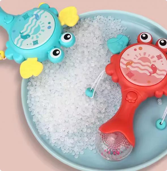 Baby Rassel Krabbe - Lernspielzeug mit Glitzergriff